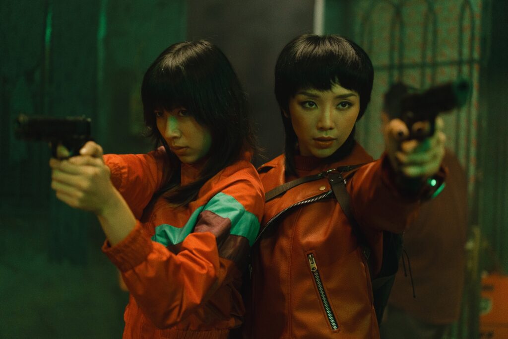 Toc Tien stars as Thanh (right), a protective elder sister in 'Furies'.