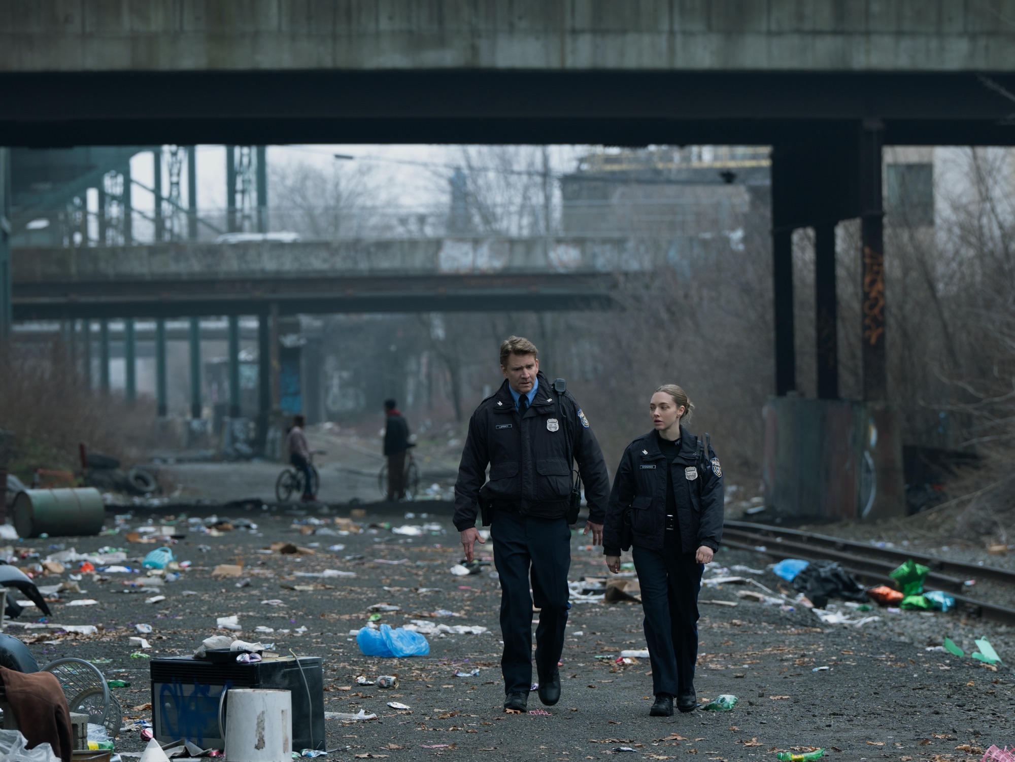 LONG BRIGHT RIVER -- "These Girls" Episode 101 -- Pictured: (l-r) Dash Mihok as Lafferty, Amanda Seyfried as Mickey — (Photo by: David Holloway/PEACOCK)