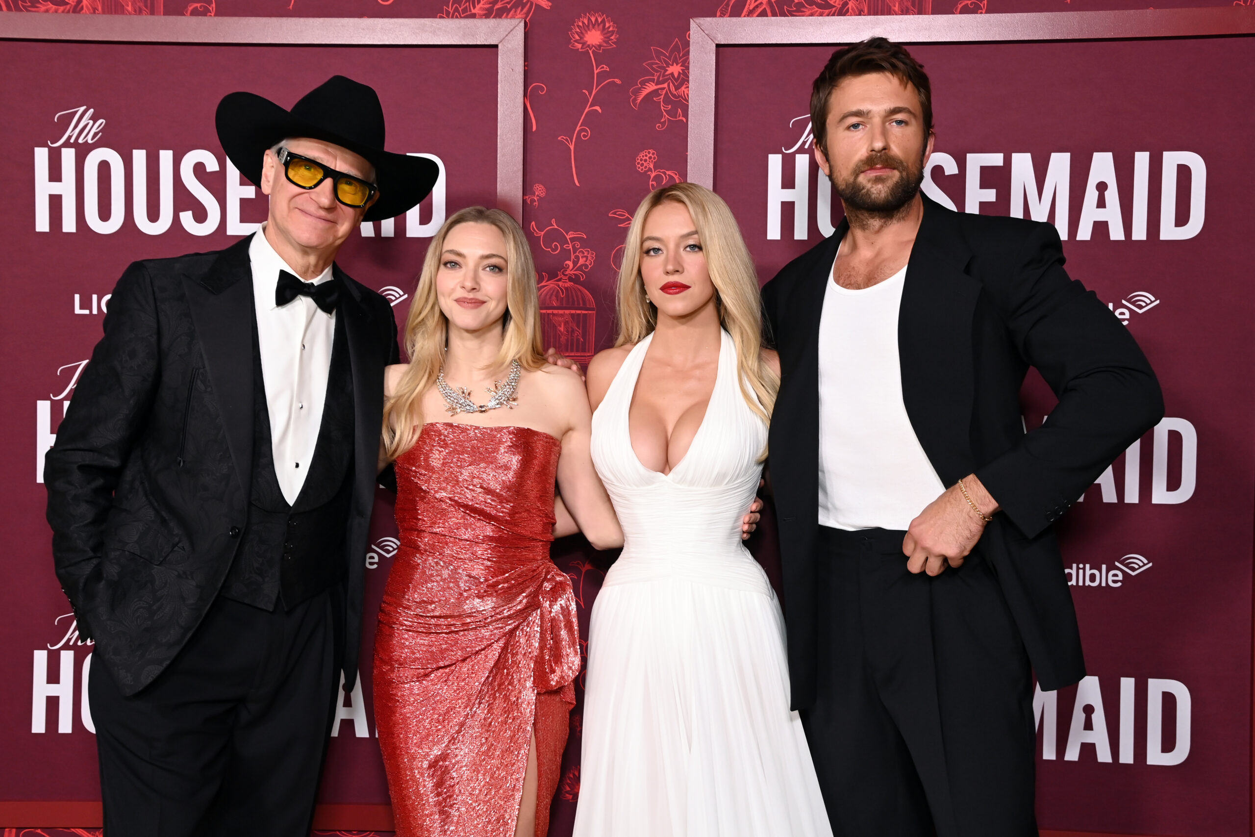 LOS ANGELES, CALIFORNIA - DECEMBER 15: (L-R) Paul Feig, Amanda Seyfried, Sydney Sweeney and Brandon Sklenar attend Lionsgate's LA Premiere of "The Housemaid" at TCL Chinese Theatre on December 15, 2025 in Los Angeles, California. (Photo by Jon Kopaloff/Getty Images for Lionsgate)