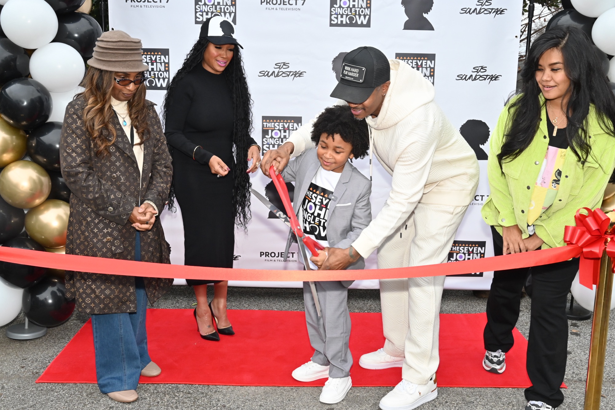 Grand Opening for Seven John Singleton's Studio Photographed By Tommie Peterson